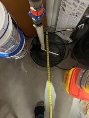 Before: Our Design Specialist, Gary, recommended securing a Radon Mitigation System to lower the radon levels.