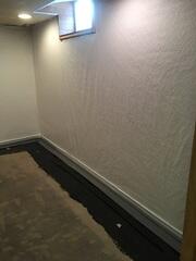 During: Our Foreman, Chris, and his crew successfully secured all the products throughout the basement.