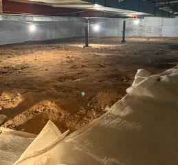 Before: Our Design Specialist, Chuck, recommended securing several waterproofing products throughout the crawl space.
