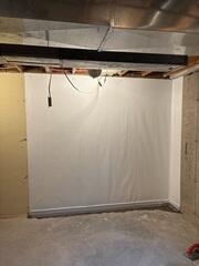 During: Our Foreman, Diego, and his crew secured WaterGuard and CleanSpace on the north wall.