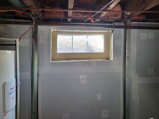 Foundation wall repair with CarbonArmor and PowerBrace in Sainte-Henedine, ...