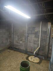 We installed GeoLocks, WaterGuard, and a SuperSump sump pump to take care of both the foundation and water issues.