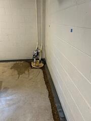 During: Our Foreman, Kevin, and his crew secured all the waterproofing products along the water-damaged wall.