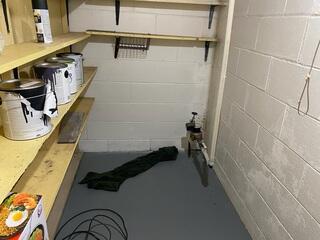 Before: Our Design Specialist, Mac, determined that the basement required waterproofing.