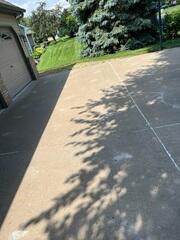 During: Our Foreman, Dylon, and his crew successfully lifted and leveled the sidewalk back into place.