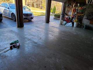 Work in progress on a Pickering garage using non-invasive polyurethane concrete leveling. Our poly-injection process stabilizes sunken slabs without disrupting storage, vehicles, or equipment.