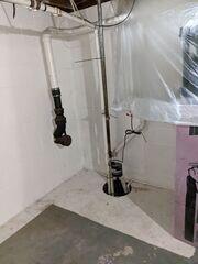 Before: Our Design Specialist, Mac, recommended securing the waterproofing products throughout the basement.