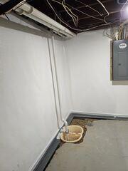 During: Our Foreman, Lane, and his crew successfully secured all the waterproofing products throughout the basement.
