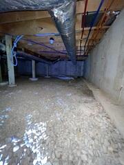 A homeowner in Stamford, Vermont, was dealing with a consistently damp crawl space that was affecting the home's overall comfort. The space had an exposed, rock-covered floor and allowed moisture to enter freely, especially during rain and seasonal thaw.