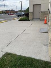 Using precision poly-injection, we lifted the sunken slabs back to a flush, level position. The yellow-marked hazards were permanently neutralized, leaving a safe, AODA-compliant entrance for all church members.