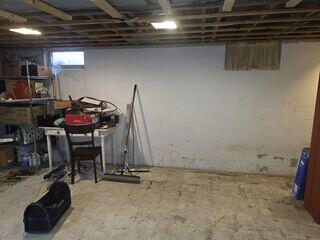 Before: Our Design Specialist, Darin, recommended securing several waterproofing products throughout the basement.
