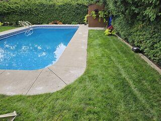 When the pool deck pulls away from the coping, water seeps underneath and washes out the soil. We stabilized this entire stretch by injecting a structural polymer to strengthen the ground and support the concrete. The result is a level, secure surface that protects the pool's edge from further shifting.