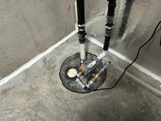 Before: Our Design Specialist, Jason, suggested securing WaterGuard to prevent further water damage.