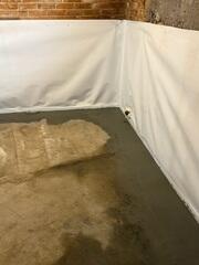To properly manage the water intrusion, a comprehensive interior waterproofing system was installed, including:

WaterGuard® perimeter drainage system
TripleSafe® sump pump system
CleanSpace® wall system to manage wall moisture