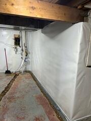 During: Our Foreman, Kevin, and his crew secured WaterGuard, CleanSpace, and the new sump pump in the basement.