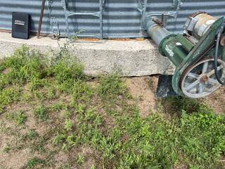 Before: Our Design Speicalist, Gary, recommended securing Helical Piers below the settling and sinking foundation.