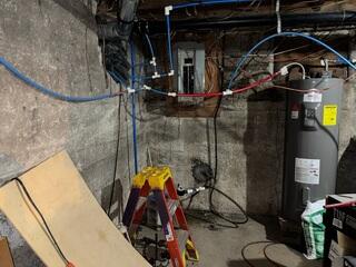 Before: Our Design Specialist, Ryan, recommended waterproofing products throughout the basement.