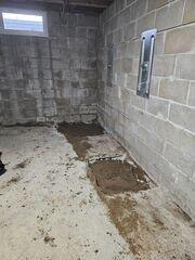 During: Our Foreman, Juan, and his crew secured the GeoLock Wall Anchors along the west wall.