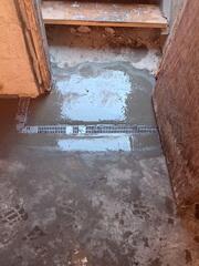 WaterGuard® Interior Drainage System installed along the basement perimeter to intercept water at the point of entry
TrenchDrain™ System placed in key areas to capture surface water before it could spread across the floor