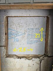 The entrance to the crawl space in Coventry, Vermont.