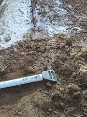 LawnScape™ Outlet installed to direct water safely away from the foundation