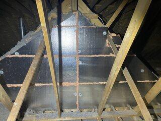 SilverGlo™ rigid foam insulation on the gable wall, sealed with ZypFoam™