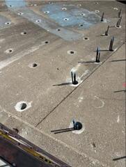 Core holes in concrete with some Injection tubes installed.