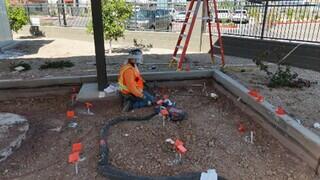 Installing PolyLevel at electrical vaults under solar panel area