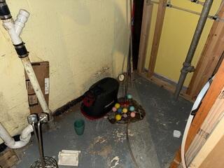 Before: Our Design Specialist, Chuck, recommended waterproofing the leaky corner.
