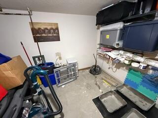 Before: Our Design Specialist, Chuck, recommended waterproofing the entire basement.