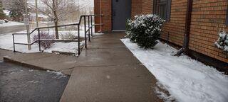 Settled concrete at these double doors created an uneven gap and a major liability for the property owner. In just a few hours, we stabilized the area and brought the steps back to their original height without any messy excavation.