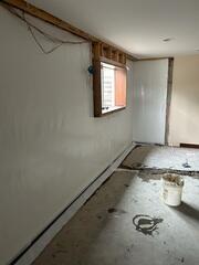 During: Our Foreman, Jose, and his crew worked hard to secure all the products in the basement.