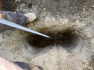 The crew installed the earth anchor and attached it to the interior wall