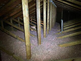 The bath fan exhaust routed directly into the attic