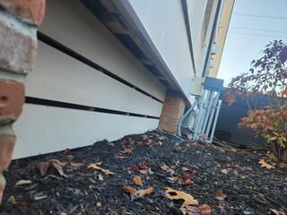 After inspecting the exterior, we located the area where the raccoon got it - which was an open area underneath the deck.