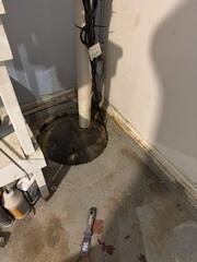BEFORE - old sump pump