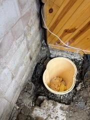 During: Our Foreman, Nanga, and his crew worked hard to secure all the waterproofing products in the basement.