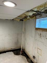 During: Our Foreman, Kevin, and his crew successfully secured all the products in the basement.