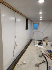 During: Our Foreman, Jose, and his crew succesfully secured all the products throughout the basement.