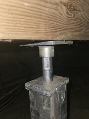 SmartJack installation under the crawlspace.