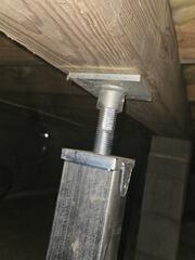 SmartJack installation under the crawlspace.