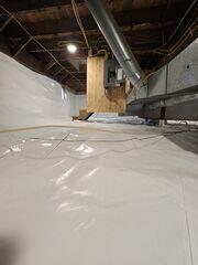 CleanSpace® Crawl Space Encapsulation System - Installed along the floor and walls to create a continuous vapor barrier