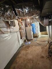 The SuperSump pump system is installed to efficiently remove water from the basement.