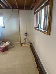 Our crew installed CleanSpace to the walls and is in the process of installing the sump system and WaterGuard