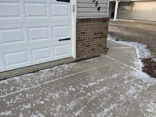Before: Our Design Specialist, Ian, suggested securing several concrete repair products throughout the basement.