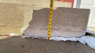 A close up of how far the slabs have sunken from its original position