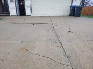 Uneven to Level: Concrete Driveway Driveway Repair in Appleton, Wisconsin