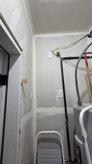 Before: Our Design Specialist, Derek, suggested securing a Radon Mitigation System in the home.