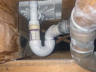 The bathroom pipes are freezing, and as the water expands, it increases the risk of the pipes bursting.