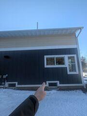 The exterior of the home before our radon mitigation system is installed